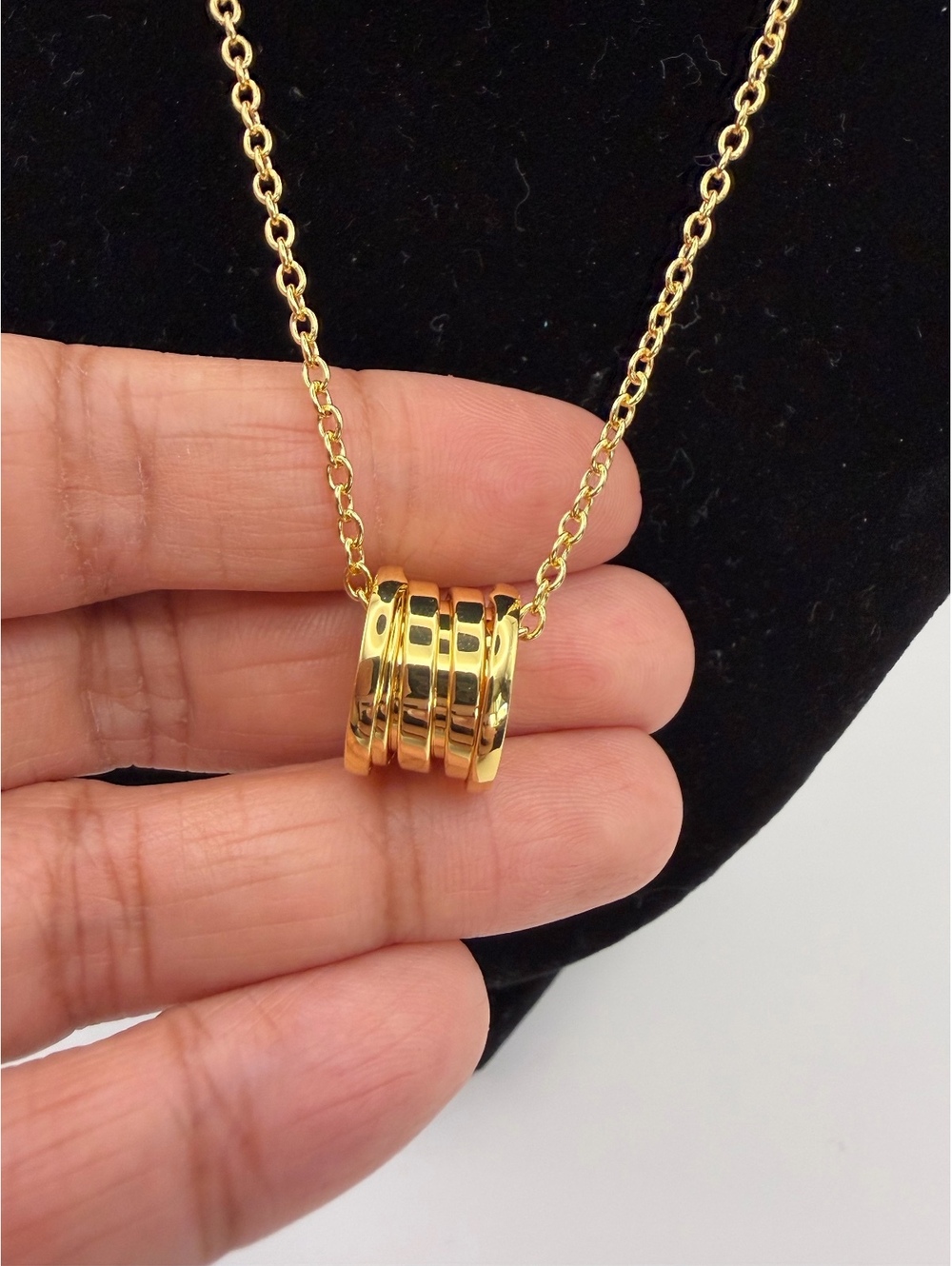 Elegant Gold-Tone Multi-Ring Pendant Necklace
